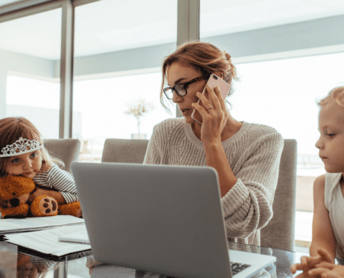 Mum working from home on laptop